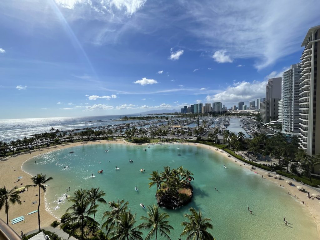Aerial view of the turquoise lagoon and city skyline in Honolulu, Oahu.