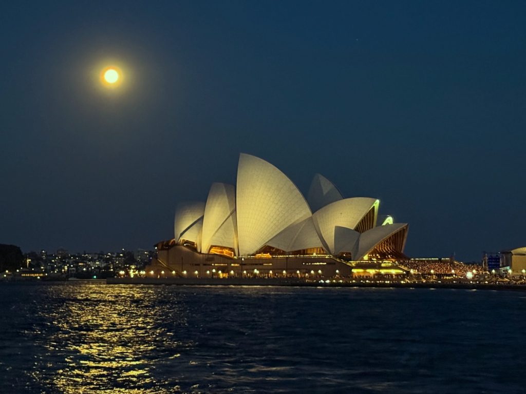 Sydney Opera House with the moon in the background. Sydney Australia travel guide