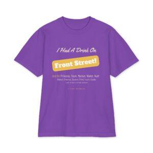 Unisex max heavyweight short sleeve t-shirt in purple featuring white and yellow “I Had A Drink On Front Street!” text across the front and a list of other street names below. Made from premium heavyweight cotton with short sleeves, it includes small text at the bottom that reads, “ITS NEW WILMINGTON.”.