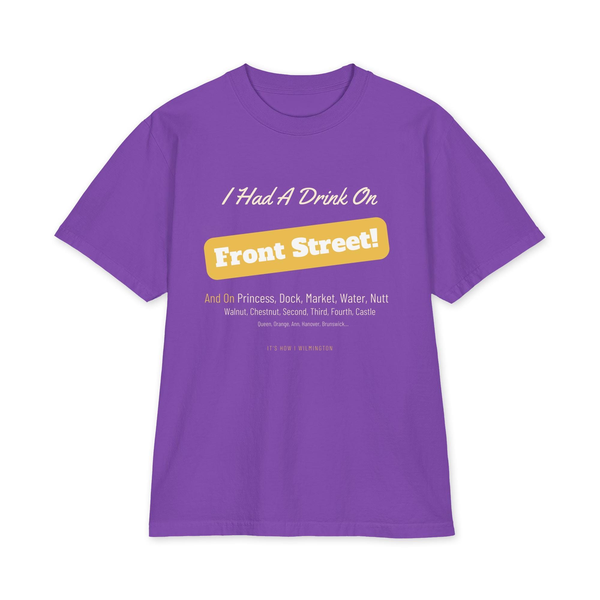 Unisex max heavyweight short sleeve t-shirt in purple featuring white and yellow “I Had A Drink On Front Street!” text across the front and a list of other street names below. Made from premium heavyweight cotton with short sleeves, it includes small text at the bottom that reads, “ITS NEW WILMINGTON.”.